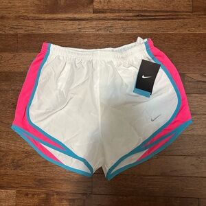 Nike Women's White and Pink Athletic Shorts with Blue Trim